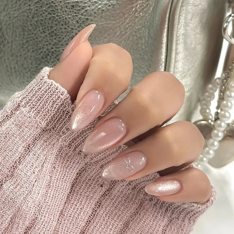 Almond Shape Nude Pink Pearlescent Shine Press-ons with a bow