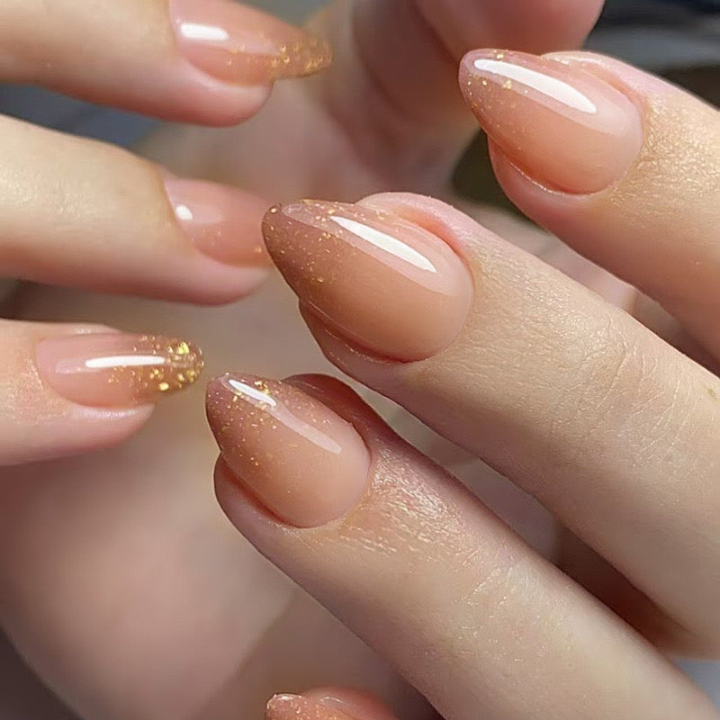 Festive Trendy Gold Glitter Tips with Nude Base Almond Shape Press-ons